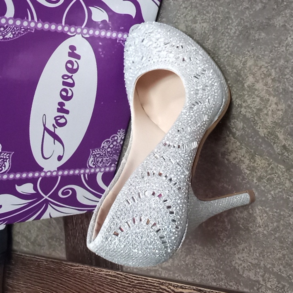 silver high heel shoe
